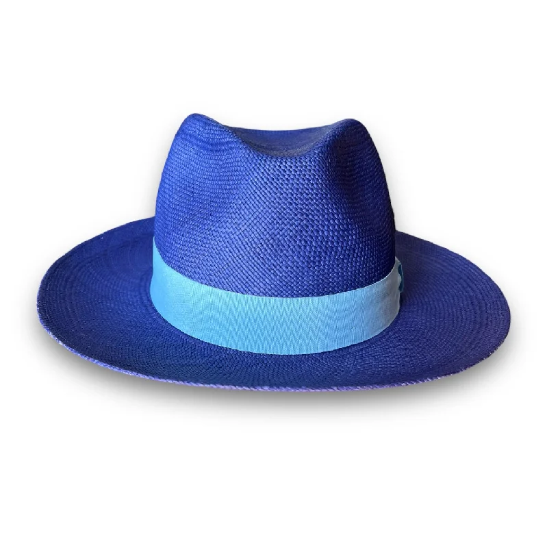 Stylish straw sun hat for women with a decorative bow for added elegance -The FLAMEKEEPERS HAT CLUB JET FUEL PANAMA COBALT BLUE