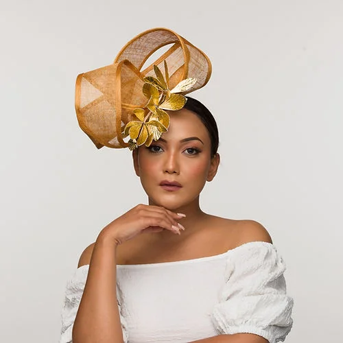 Lightweight wool felt hat for travel ease -Nyx- gold fascinator with leather floral mount