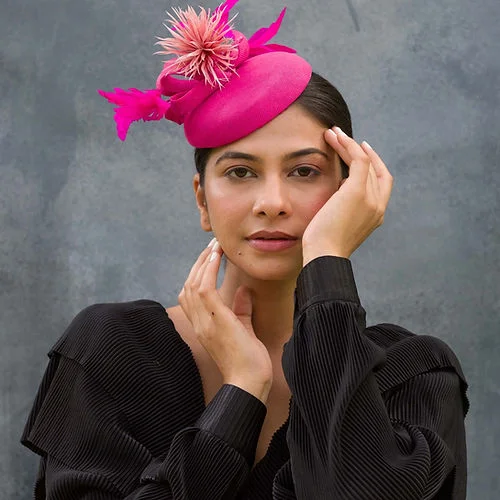 Black felt hat for sleek minimalist looks -Fuschia fascinator with feather twirls and dusty pink biot feather flower